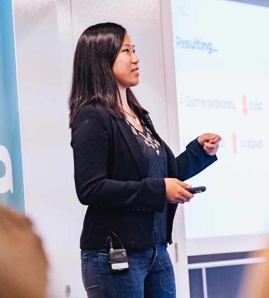 Alyssa Yap presenting at a marketing conference